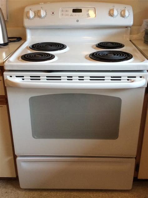 If yours are dirty, lightly wipe them, too. GE electric coil stove Esquimalt & View Royal, Victoria