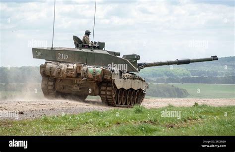 A British Army Challenger 2 Main Battle Tank In Action In A