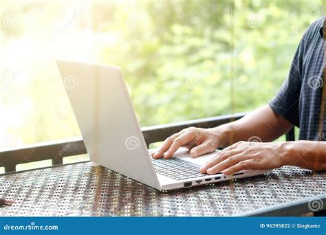 Stock Photo Man Hand Typing Laptop Or Notebook On Vintage Old Stock