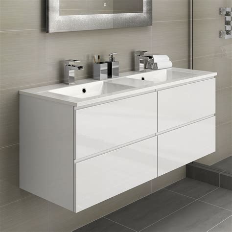 Offering ample bathroom storage space with a touch of elegance, vanity units are a sleek piece of furniture that can transform even the smallest of. White Double Basin Bathroom Vanity Unit Sink Storage ...