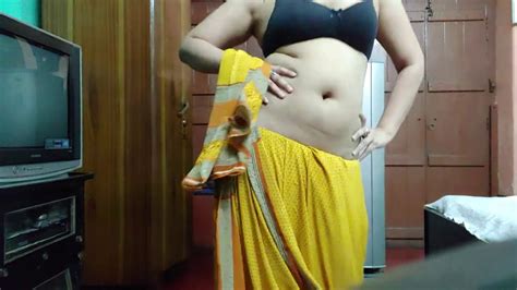 Download Beautiful Indian Aunty In Yellow Saree Big Boobs Mallu Aunty