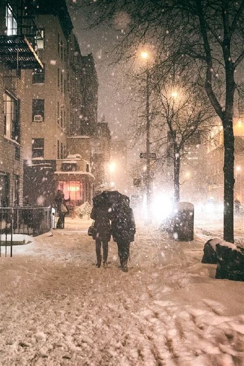 Under An Umbrella Janus Snowstorm New York City By Vivienne Gucwa