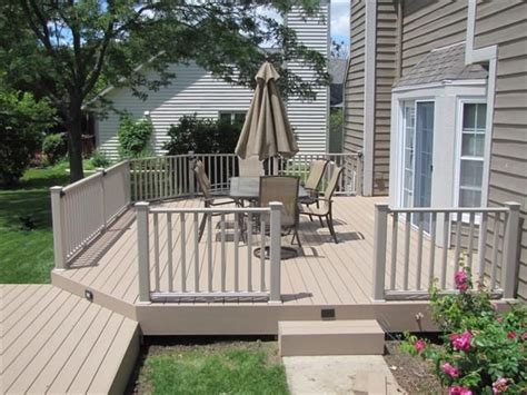 Certainteed evernew decking and railing products give building professionals and homeowners confidence that the homes they design, build, maintain, and. Sandridge Timbertech XLM decking with Clay Certainteed Kingston vinyl railing | Outdoor living ...