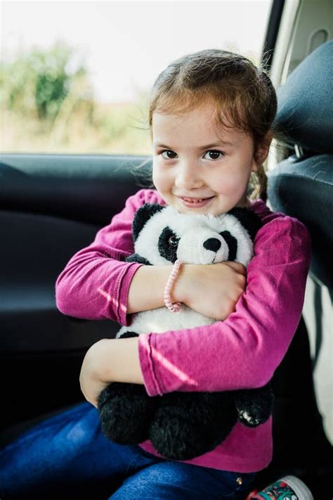 Little Girl Holding A Toy Stock Photo Image Of Holding 263172646