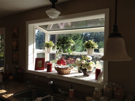 Grow an indoor herb garden like this on your kitchen window. KITCHEN GARDEN WINDOW | Garden Windows | Pinterest ...