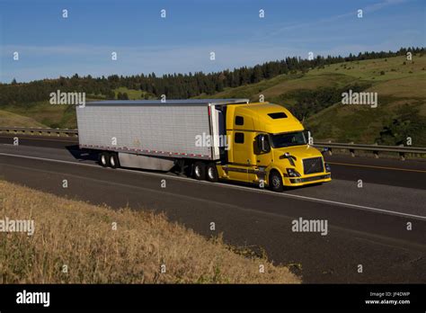 Yellow Volvo Semi Truck White Unmarked Trailer Stock Photo Alamy