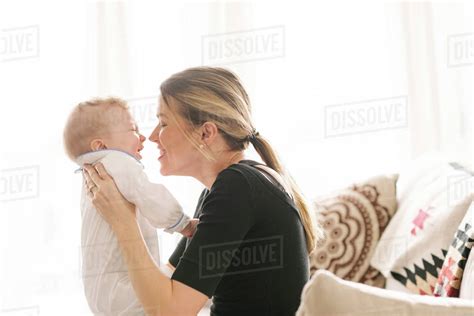 Mother And Baby Bonding At Home Stock Photo Dissolve