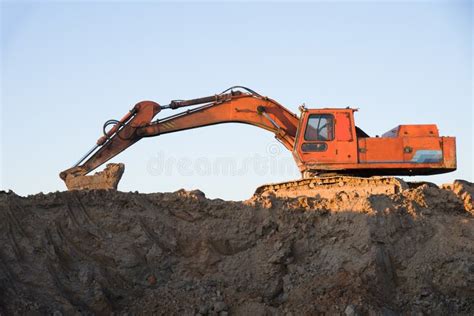 Track Type Excavator During Earthmoving Work At Open Pit Mining Loader