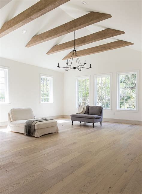 Expansive Modern Living Room With Vaulted Ceiling And Exposed Beams