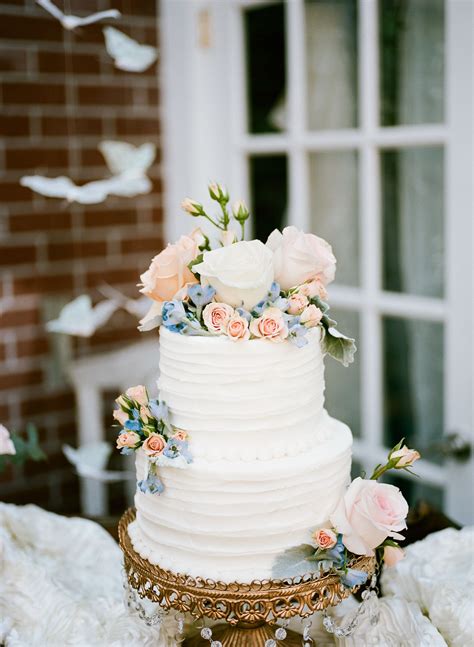 Buttercream Wedding Cake With Blush And Blue Flowers