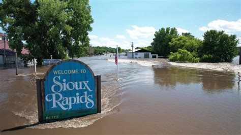 Record-Breaking Floods Ravage Northern Iowa, Causing Evacuations and