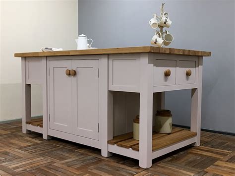 A kitchen island is more than the space between your cabinets. Freestanding Kitchen Island with Double Cupboards & Deep ...