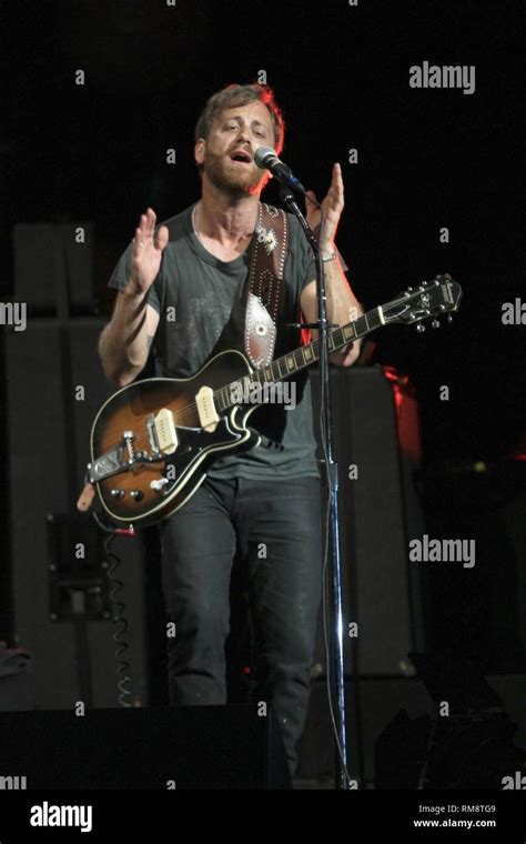 Singer Songwriter And Guitarist Dan Auerbach Is Shown Performing On