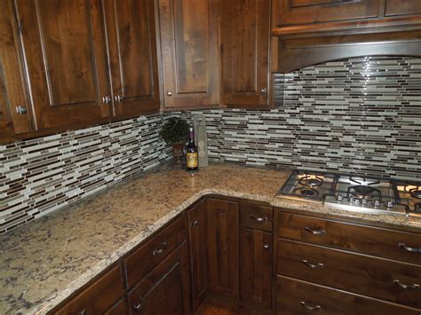 Many looks can be carried out by all different types of tiles, whether they are glass, metal, travertine, marble, granite, soapstone, limestone, ceramic, porcelain, slate or any natural stone tile product. What's A Countertop Without Awesome Tile Backsplash ...