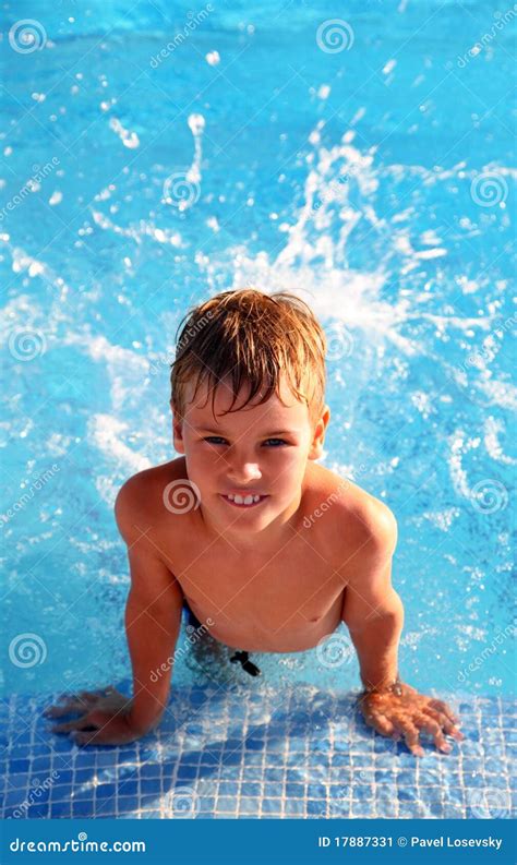 Boy Splash Around In Water In Swimming Pool Stock Image Image 17887331