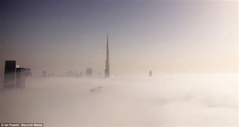 The City In The Clouds Dramatic Images Of Dubais Skyscrapers Poking