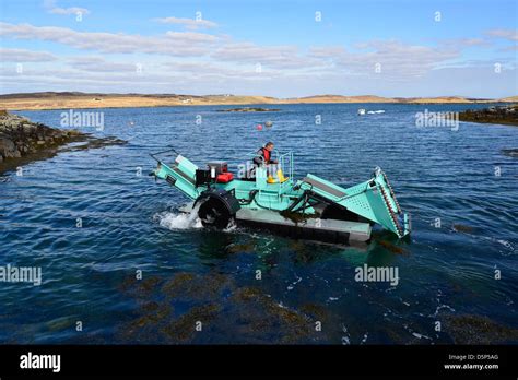 A Seaweed Harvesting Machine In The Outer Hebrides Of Scotland Stock