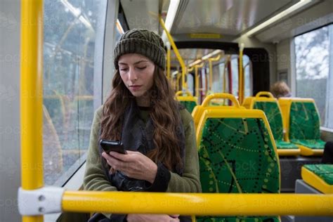 Image Of Young Woman Riding The Tram