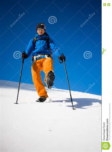 Mountain Climber Walks On A Snowy Slope Stock Photo Image Of Hiking