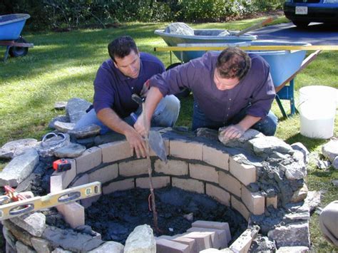 Pyzique firepit w/ granite top. Landscaping Ideas Build a stone fire pit