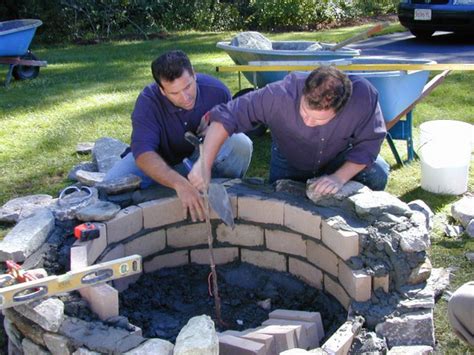 If you've got your heart set on a brick patio with a fire pit, consider what style would go best with the overall look: Landscaping Ideas Build a stone fire pit