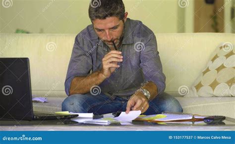 Young Attractive And Busy Man At Living Room Sofa Couch Accounting