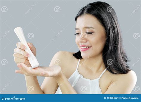 asian woman using a body lotion stock image image of adult cream 100904579