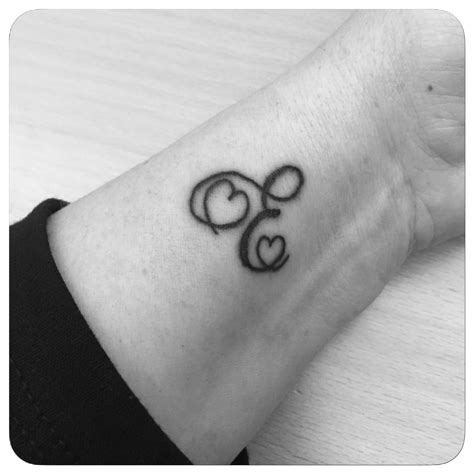 See more ideas about tattoo lettering, initial tattoo, heart tattoo. E letter tattoo, heart tattoo, mother's tattoo. | Tattoo ...