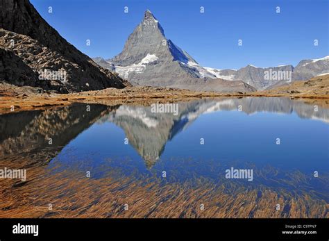 The Matterhorn Is Reflected In Riffelsee Lake Above Zermatt Gornegrat