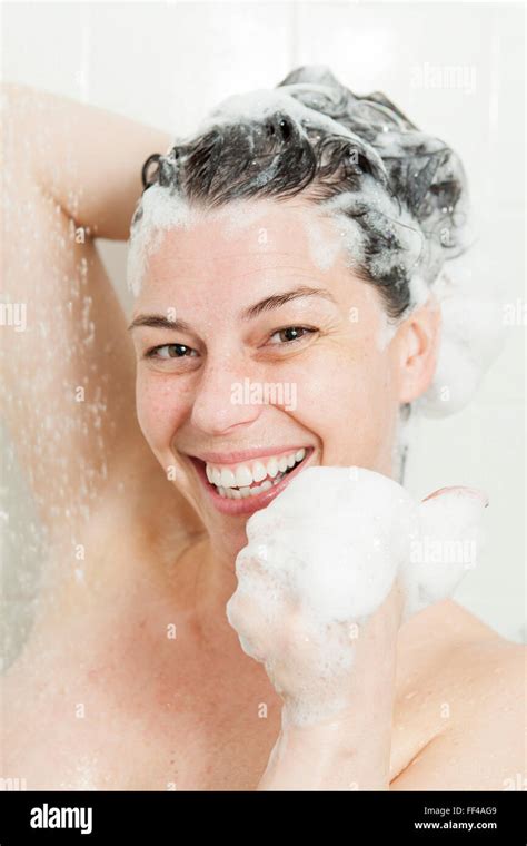 Shower Woman Happy Smiling Woman Washing Shoulder Showering In Stock Photo Alamy