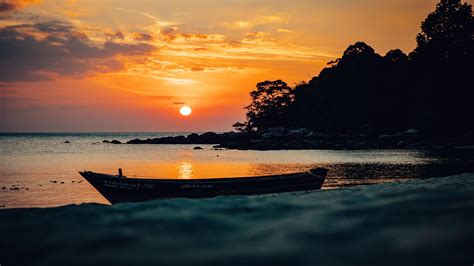 Boat Near Seashore In Sunset 4k Wallpaper