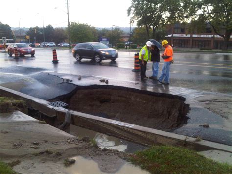 Massive Sinkhole On Woodbine Following Watermain Burst 680 News