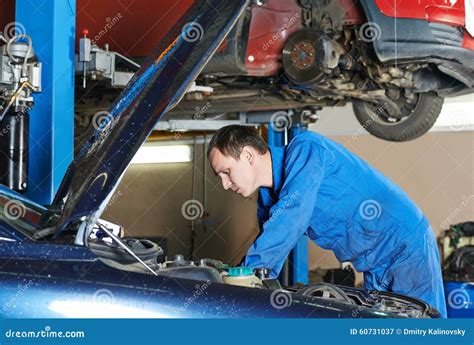 Auto Mechanic Repairman At Work Stock Image Image Of Maintenance