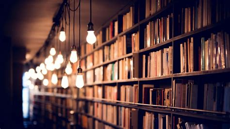 Books Library Shelves Lighting K HD Wallpaper