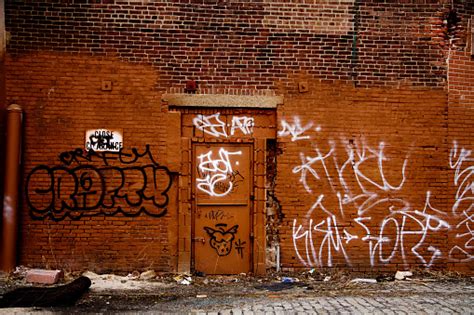 Graffiti Covered Brick Wall In The City Stock Photo Download Image