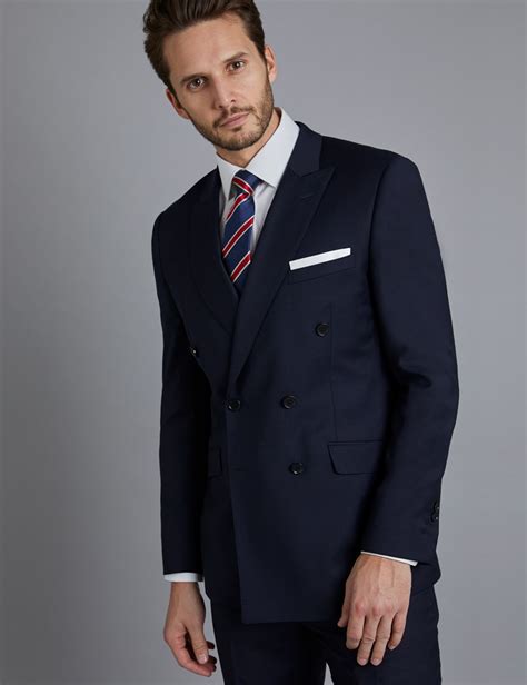This exquisite navy blue double breasted slim fit suit jacket is made from the finest super 100s wool and it features chalk stripes. Men's Navy Twill Slim Double Breasted Fit Suit | Hawes ...