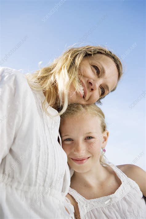 Mother And Daughter Sitting Together Stock Image F0031708 Science Photo Library