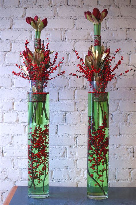 Festive Modern Arrangements Using Red Amaryllis Red Ilex Berries And