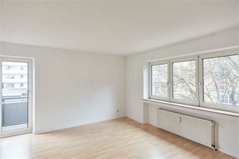 Empty Room As Living Room In Apartment After Renovation Stock Photo