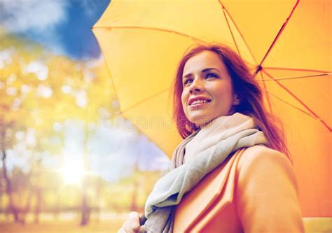 Happy Woman With Umbrella Walking In Autumn Park Stock Photo Image Of