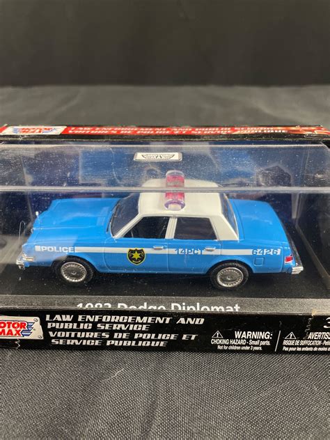 2 1983 Dodge Diplomat Police Cars Die Cast By Motor Max 143 Scale