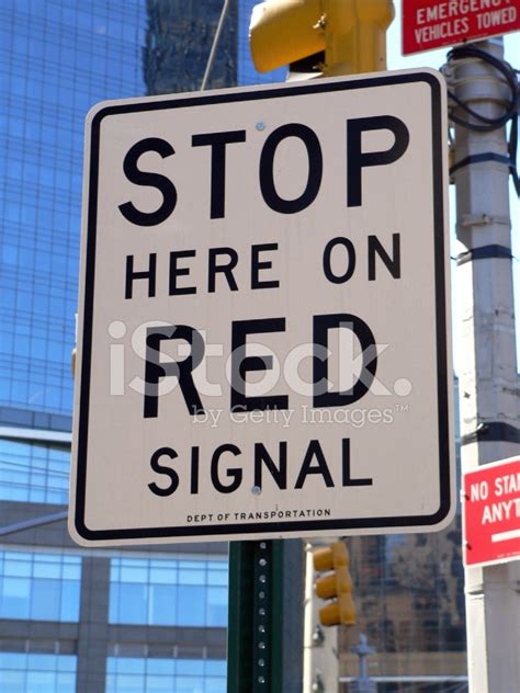 Stop Here On Red Signal Sign Stock Photo Royalty Free Freeimages