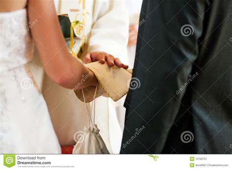Wedding Couple Receiving Blessing From Priest Stock Image Image Of
