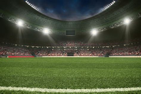 estadio de fútbol con las gradas llenas de fanáticos esperando la representación del juego