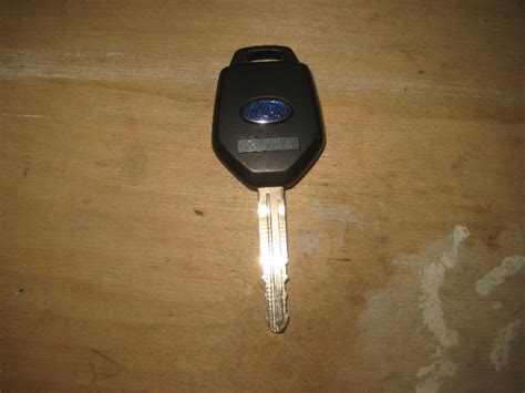How to change battery in subaru key remote (impreza forester cr1620). Subaru-Outback-Key-Fob-Battery-Replacement--Guide-002