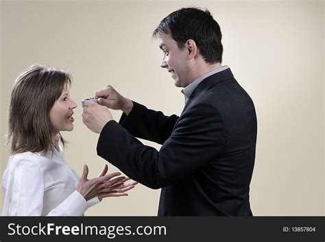 White Man Trying To Close His Wife Mouth Free Stock Images And Photos