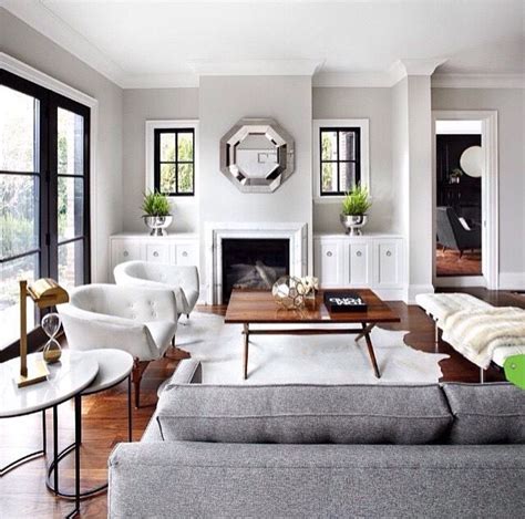 We did not find results for: Gray couch, white chairs, black doors, touch of green ...