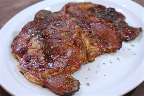 Then rub half of the sauce on the pork chops. barbecue pork chops oven recipe