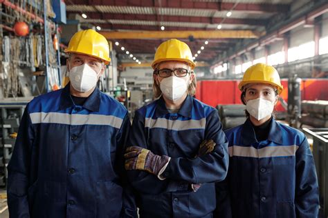 Portrait Of Manufacturing Workers In Masks Kit Ar