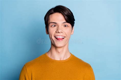 Photo Of Young Guy Happy Positive Smile Comic Fooling Tongue Out